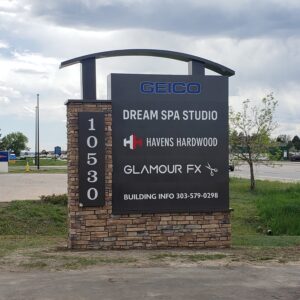 Monument-style Commercial Signs installed at the entrance of a commercial complex to improve visibility, branding, and wayfinding for businesses.
