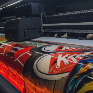 Large format printer producing high-quality Custom Signs for commercial businesses with precision printing and professional sign production. Large Format Printing